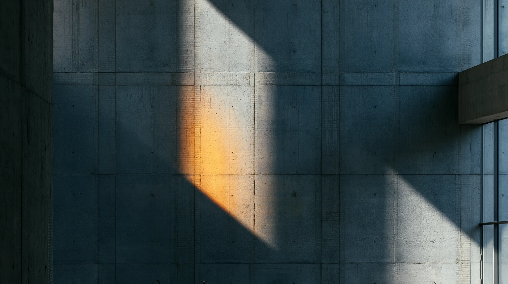 Light falling across a concrete surface.